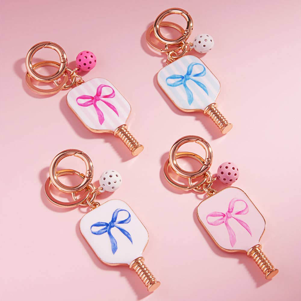 Enamel Pickleball Paddle Keychain β Blue and Pink Bow Design | Sensibling Corp. Charm