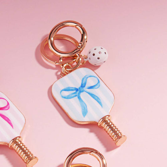 Enamel Pickleball Paddle Keychain – Blue and Pink Bow Design | Sensibling Corp. Charm